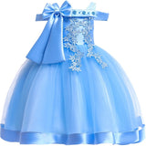 Party dress with bow and appliqué for ages 3 to 10.