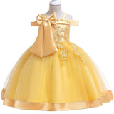 Party dress with bow and appliqué for ages 3 to 10.