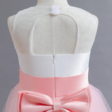 Long Kids party dress made of lace with embroidered flowers, bows, rhinestones, and sequins.