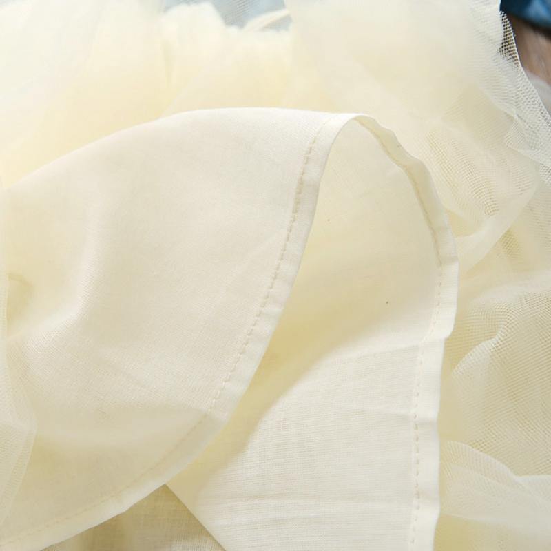 Denim tulle dress with bow.