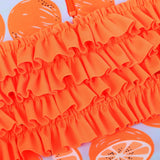 Long-sleeved swimsuit for girls from newborn to 6 years old, orange, with UPF 50+ protection. Kids UV clothing.