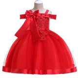 Party dress with bow and appliqué for ages 3 to 10.