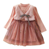 Cute dress with attached plush vest.