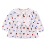 Polka dot dress with sailor-style collar.