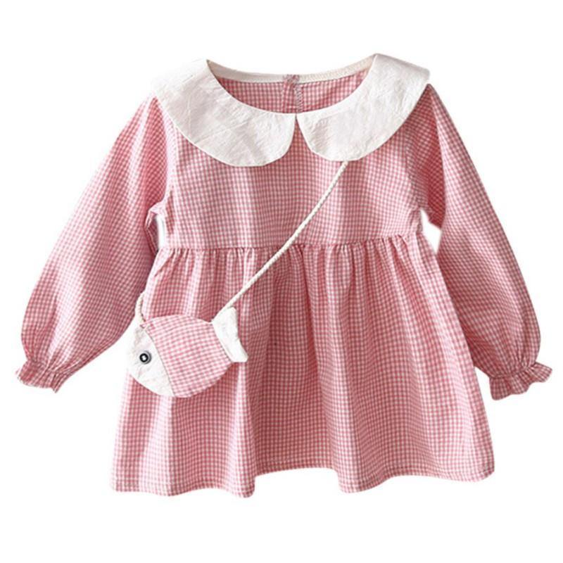 Checkered dress with fish-shaped purse.