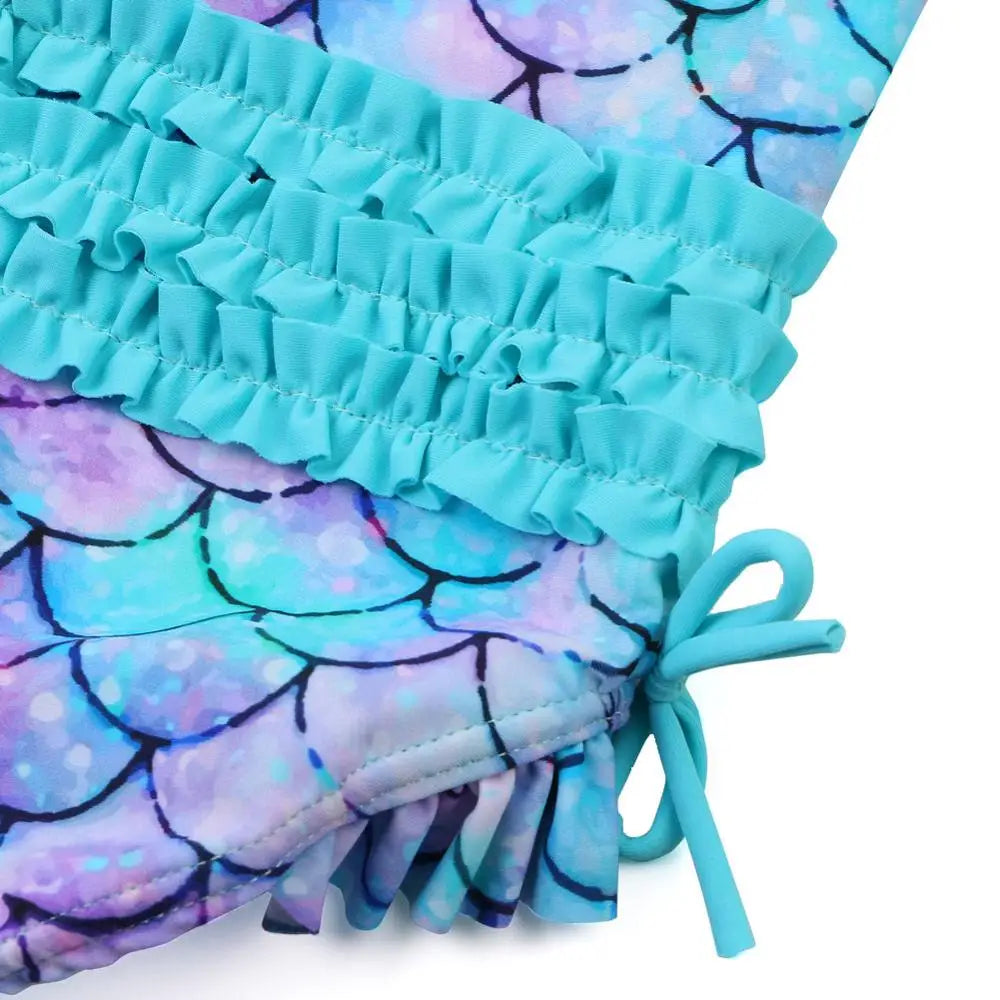 Long-sleeved mermaid swimsuit for girls aged newborn to 6 years with UPF 50+.