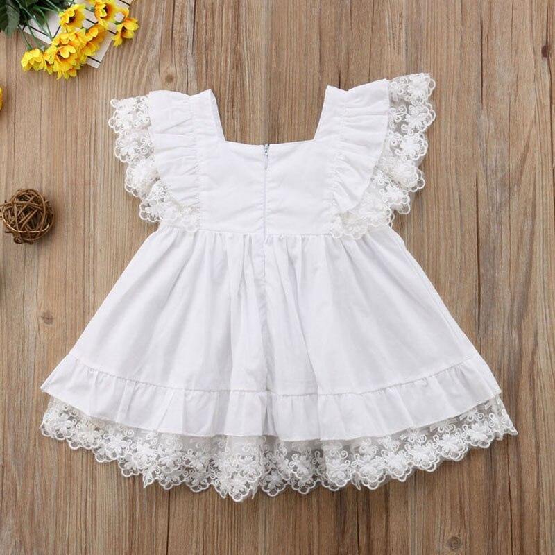 White Lace Dress with Fly Sleeves