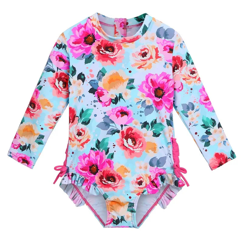 Long-sleeved swimsuit for girls from newborn to 6 years old, blue floral design, with UPF50+ sun protection.