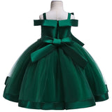 Party dress with bow and appliqué for ages 3 to 10.