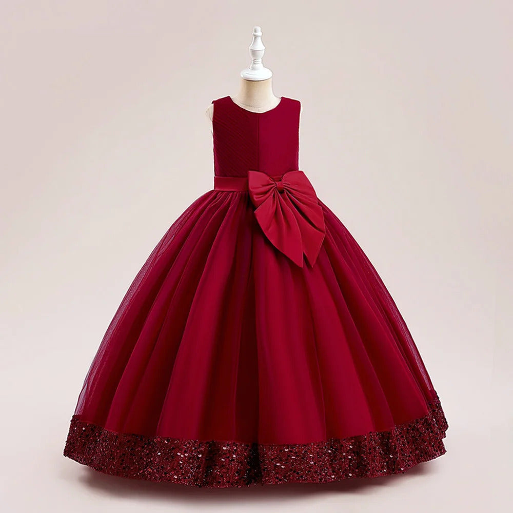 Sequin dress with hem and large bow for Kids.