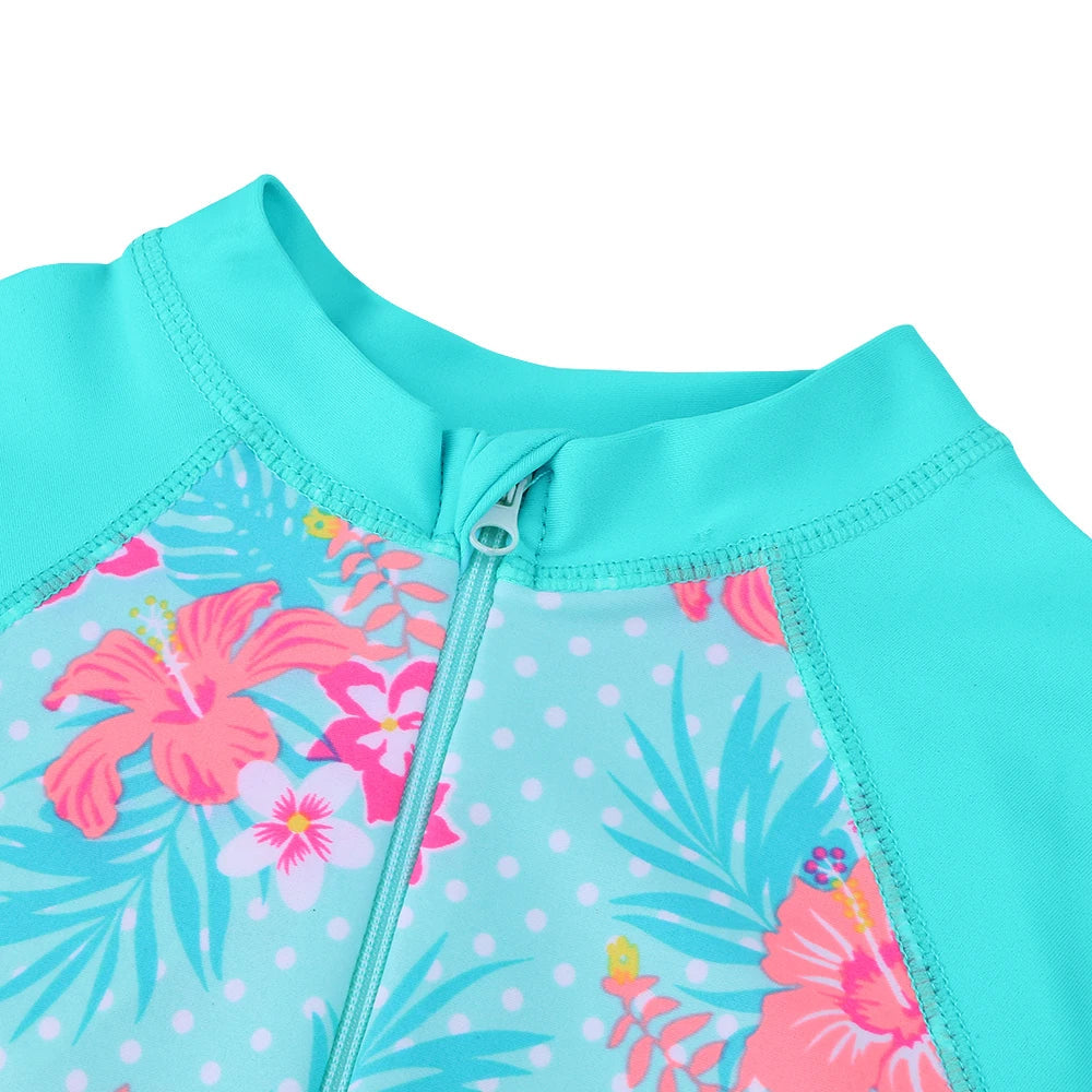 Long-sleeved swimsuit for girls aged 1 month to 6 years, blue floral design, with UPF 50+ protection. Kids UV clothing.