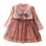 Cute dress with attached plush vest.