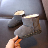 Plush-lined Kids booties, unisex, for winter.