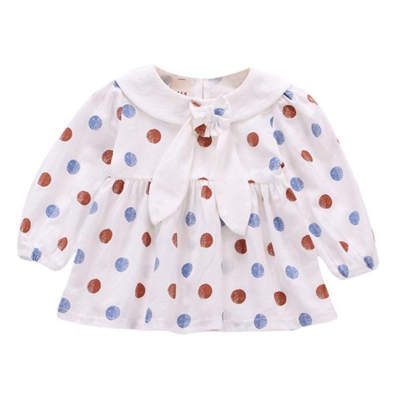 Polka dot dress with sailor-style collar.