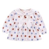 Polka dot dress with sailor-style collar.