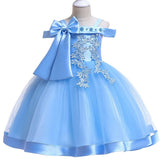 Party dress with bow and appliqué for ages 3 to 10.