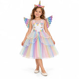 AI-generated studio image of a fictional child wearing White Layered Unicorn Costume Dress with Wings on a white background.