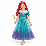AI-generated studio image of a fictional child wearing Ariel Teal Shell Costume Dress with Accessories and Wig on a white background.