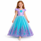 Ariel lavender shell costume dress with puff sleeves and teal skirt with purple floral overlay, worn by a child.